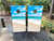 cornhole boards featuring a beach scene