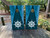 cornhole boards featuring a Blue Wood Grain and white ships wheel