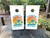 Cornhole boards featuring a palm tree and a sunset  with Summertime and Palm Beach text
