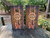 Rustic woodgrain cornhole boards featuring a stars-and-stripes Bigfoot silhouette, the year “1776,” and a circle of thirteen stars—styled after the Betsy Ross American flag.