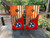 Cornhole boards featuring an orange USA flag on the top and TN flag on the bottom.