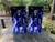Pair of cornhole boards featuring electric blue flames rising from the bottom over a black background, creating a cool yet intense visual effect.