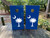 Cornhole boards with the SC logo on wood grain