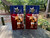 Cornhole boards featuring a waving Texas flag and a longhorn cattle