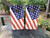 Cornhole boards featuring a diagonal USA American Flag