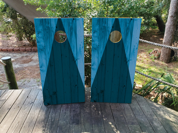 "Blue Woodgrain Triangle Professional Cornhole Boards featuring blue woodgrain texture and geometric triangle design"