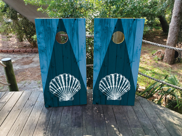 cornhole boards featuring a Blue Wood Grain and white sea shell