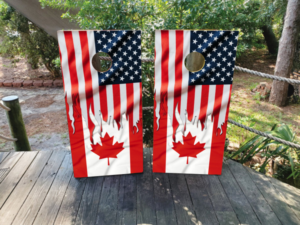 Cornhole boards featuring a waving USA and Canadian flag