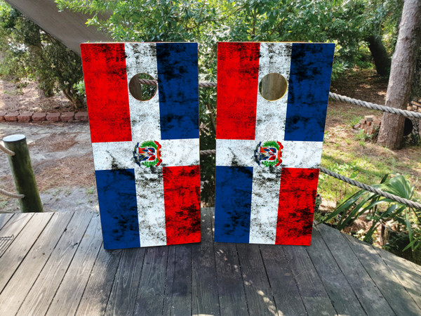 Cornhole boards featuring a distressed Dominican Republic Danish Flag