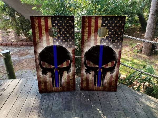 Skull on top of a USA/American Flag with a skull and thin blue line