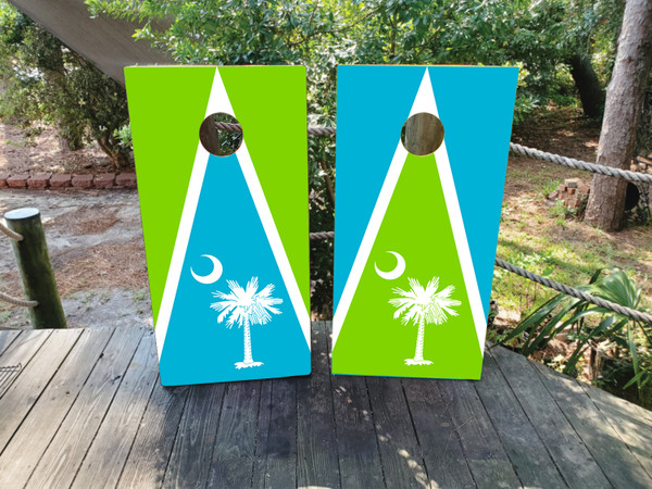 "Beachy South Carolina Cornhole Boards Design 1 featuring tropical beach scene with palm trees, ocean waves, and South Carolina state outline"