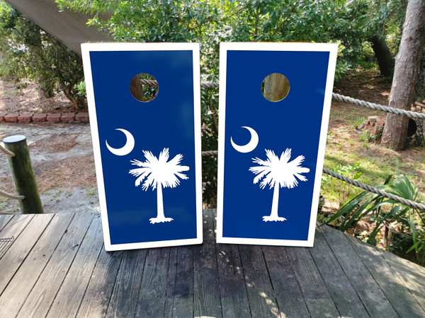 Navy cornhole boards with the south carolina logo