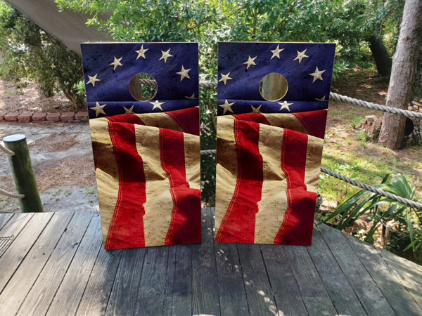 cornhole boards featuring a distressed and waving 13 colony usa american flag