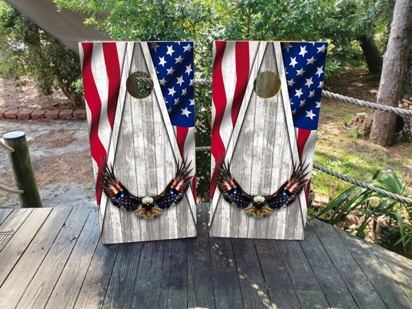 Cornhole boards featuring a USA/American flag and bald eagle