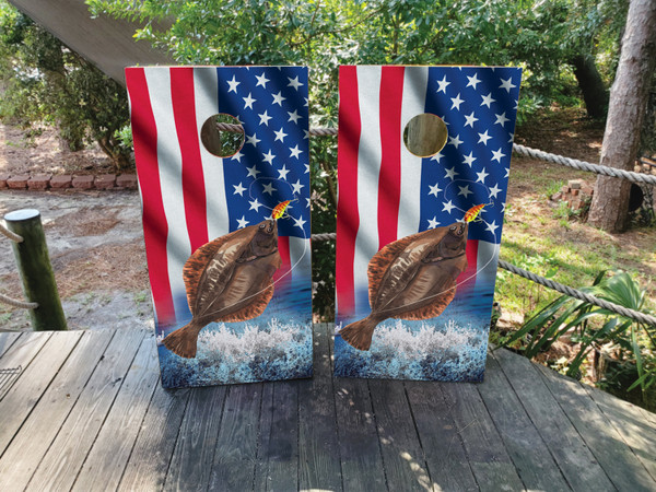Cornhole boards featuring a trout jumping out of the water with a USA American flag background