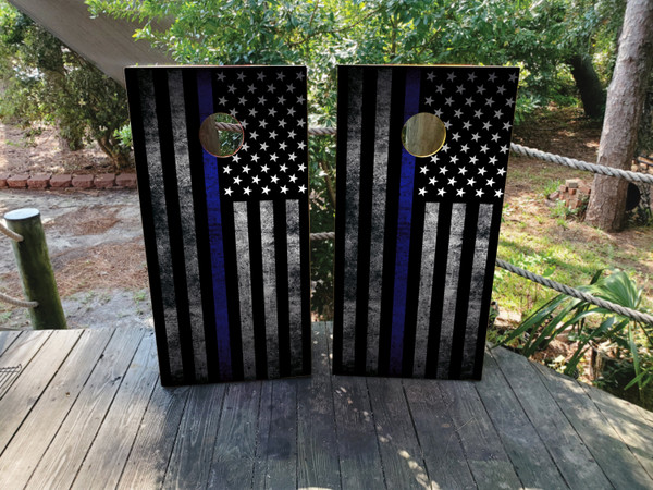 Cornhole boards featuring a black and white USA/American flag with a thin blue line
