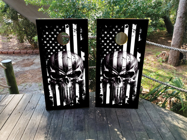Cornhole boards featuring a black and white American USA flag and skull