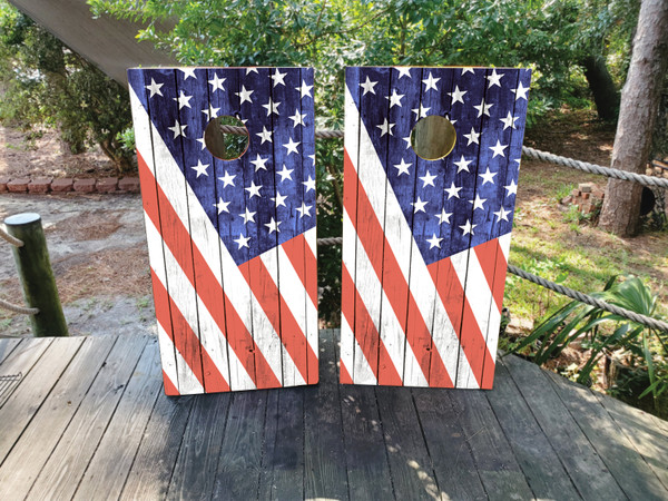 Cornhole boards featuring a diagonal USA American Flag