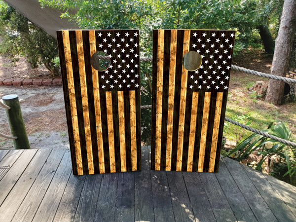 Cornhole boards featuring a usa flag on burnt wood