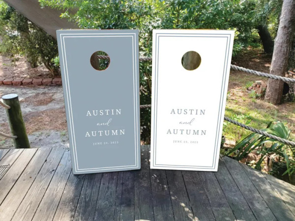 dusty blue and white cornhole boards