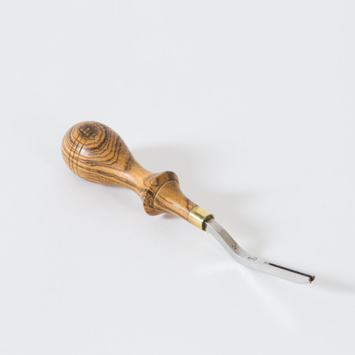 Our groover #2 lets you make a 3/64" freehand groove for stitching. The handle is made of hard wood with a beautiful wood grain and a brass ferrule which is designed to fit the hand comfortably. Our groover #2 lets you make a 3/64" freehand groove for stitching. The handle is made of hard wood with a beautiful wood grain and a brass ferrule which is designed to fit the hand comfortably.