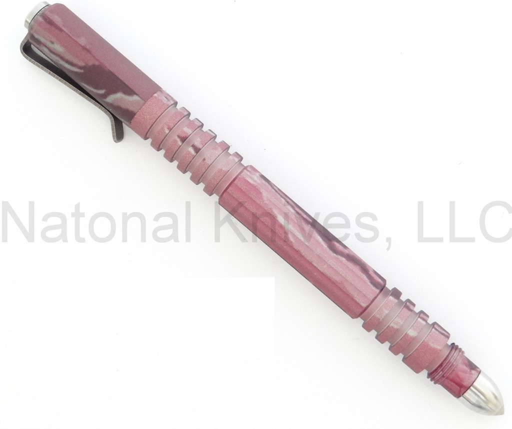 Rick Hinderer Knives Investigator ink pen - shown with cap on.  DLC pink camo aluminum construction.  Model P5801004NP.
For reference only.

