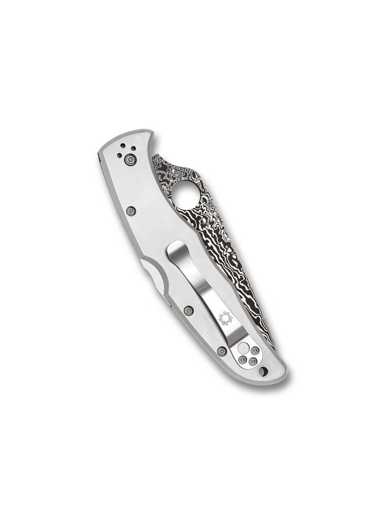 Spyderco Endura 4 folding knife with thumb hole - shown closed pocket clip side.  VG-10 Damascus steel plain edge blade.  Titanium handle.  Model C10TIPD.