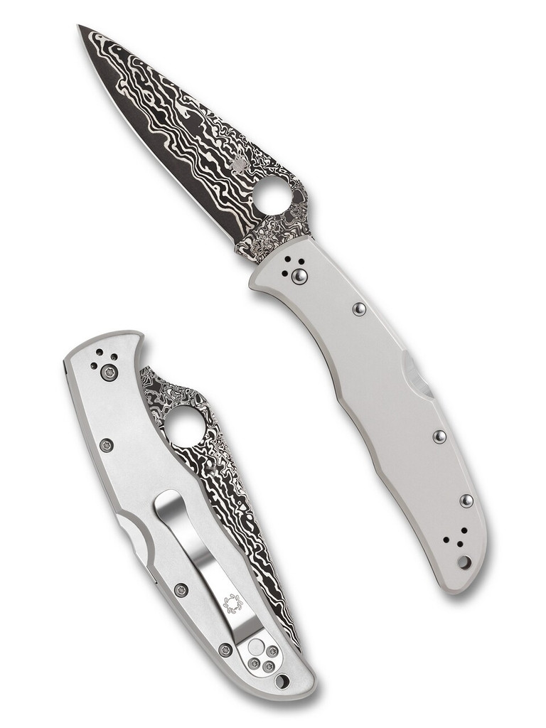 Spyderco Endura 4 folding knife with thumb hole - shown open presentation side and closed pocket clip side.  VG-10 Damascus steel plain edge blade.  Titanium handle.  Model C10TIPD.