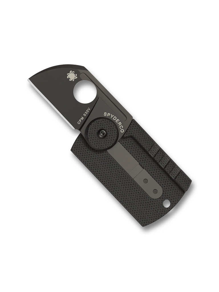 Spyderco Dog Tag Folder folding knife with thumb hole - shown open  reverse.  Black S30V stainless steel plain edge blade.  Black carbon fiber and G-10 laminate handle.  Model C188CFBBKP.