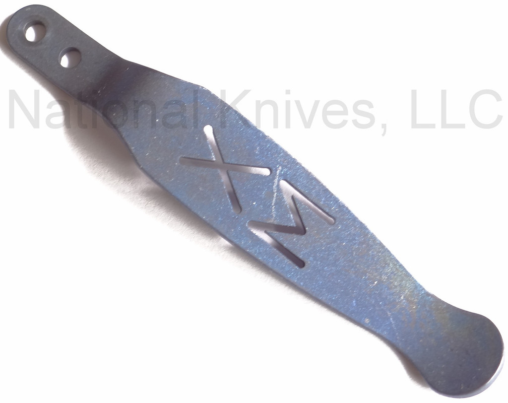 Rick Hinderer Knives XM Pocket Clip - obverse.  Battle Blue titanium construction.  Model K0020001TD-BTLBL.
For reference only.