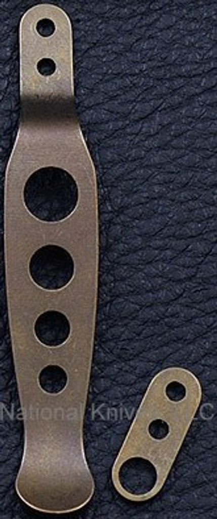 Rick Hinderer Knives Holey Pocket Clip and Filler Tab Set- obverse. Anodized Bronze titanium construction.  Model K002010HO-BR.
For reference only