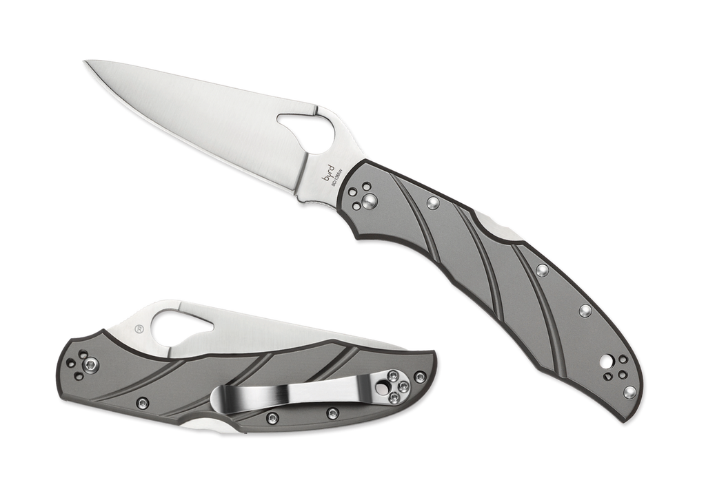 Byrd Knives Cara Cara 2 folding knife with thumb slot - shown both open presentation side and closed pocket clip side.  Satin 8Cr13MoV stainless steel plain edge blade.  Titanium handle.  Model BY03TIP2.
For reference only.