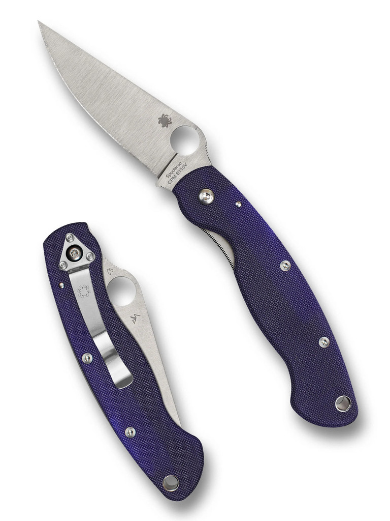 Spyderco Military folding knife with thumb hole - shown open presentation side and closed pocket clip side.  Satin S110V stainless steel plain edge blade.  Dark Blue G-10 handle.  Model C36GPDBL.