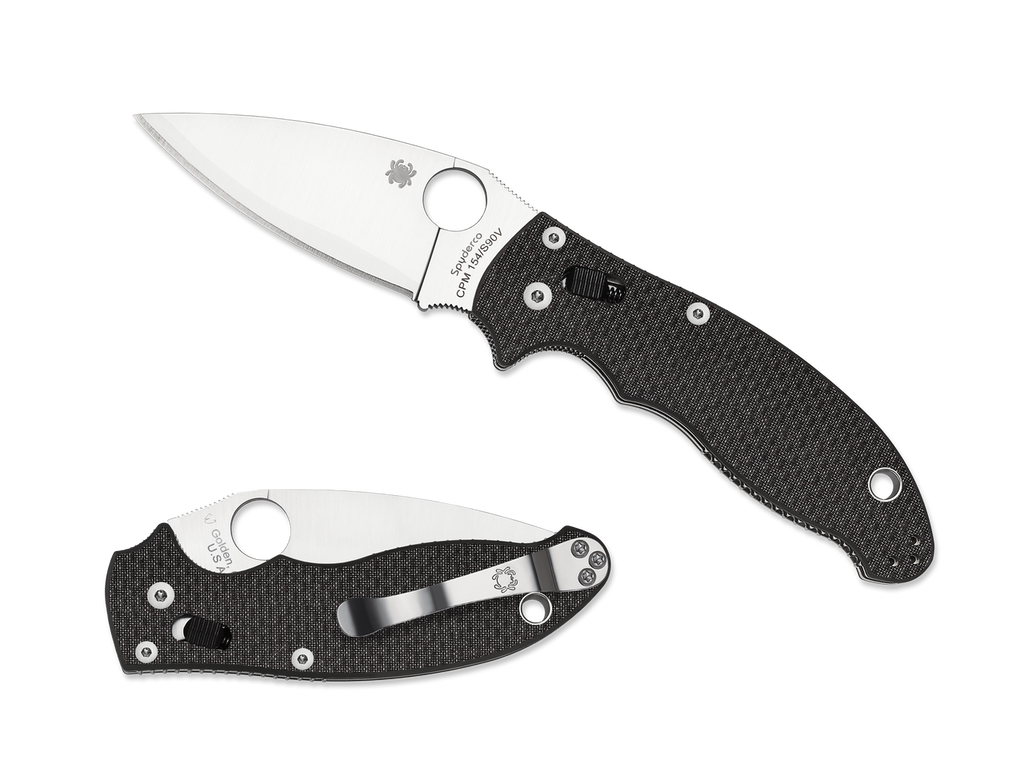 Spyderco Manix 2 Sprint Run folding knife with thumb hole - shown both open presentation side and closed pocket clip side.  Satin CPM-154 and CPM-S90V laminated stainless steel plain edge blade.  Black carbon fiber handle.  Model C101CFPE2.
For reference only.