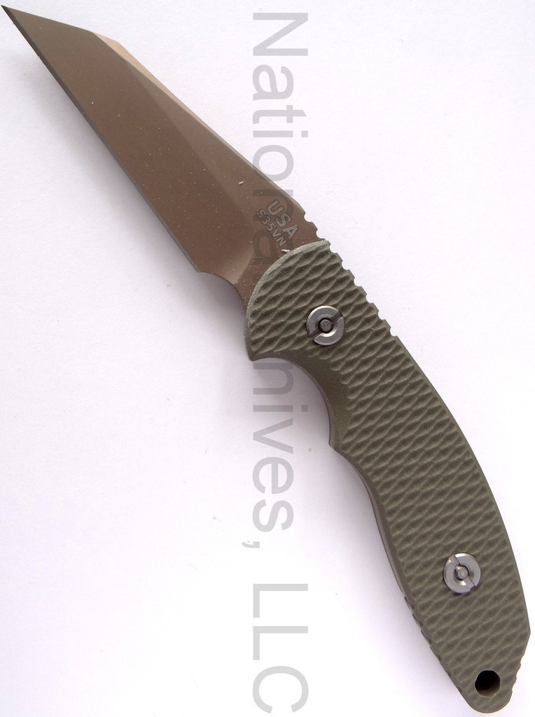 Rick Hinderer Knives FXM Wharncliffe fixed blade knife - shown out of sheath reverse.  FDE DLC S35VN stainless steel plain edge blade.  OD green G-10 handle.  Model K60120NBWH.