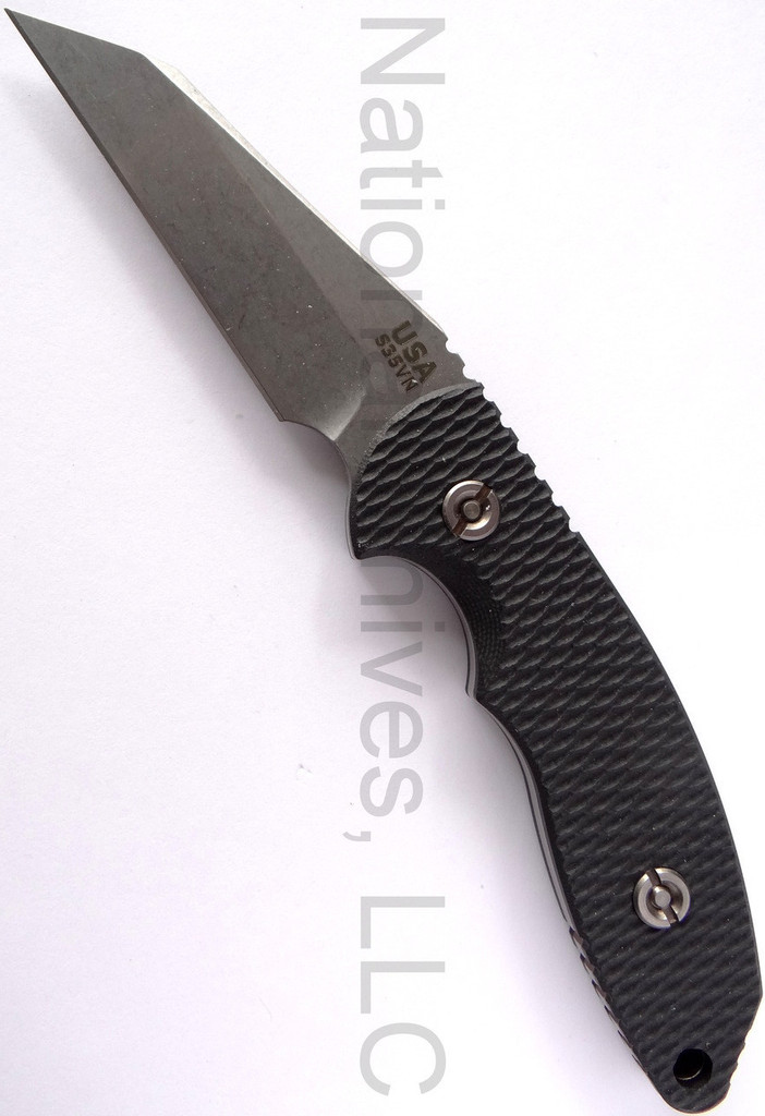 Rick Hinderer Knives FXM Spanto fixed blade knife - shown out of sheath reverse.  Stonewash S35VN stainless steel plain edge blade.  Black G-10 handle.  Model K6012000SP.