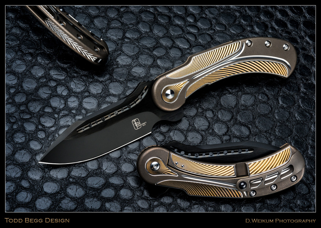 Todd Begg Knives Steelcraft Series Field Marshall folding knife - shown open presentation side, closed pocket clip side, and close up of back spacer.  2-Tone black S35VN stainless steel plain edge blade.  Bronze, gold, and silver titanium handle.  Model FM241.
For reference only.