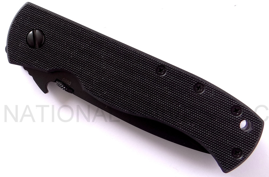 Emerson Knives CQC-7AW BTS folding knife with thumb disk and Emerson Wave opener - shown closed presentation side.  Black 154CM stainless steel combo edge blade.  Black G-10 handle.  Model CQC-7AW-BTS.
For reference only.