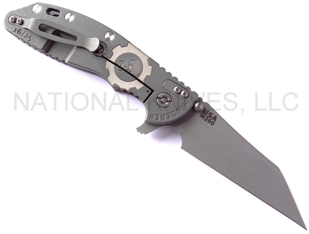 Rick Hinderer Knives Gearhead XM-24 Wharncliffe folding knife with thumb stud and flipper tab - shown open lock side.  Working Finish M390 stainless steel plain edge blade.  FDE G-10 handle with Working Finish lock side.  Model K3023SGW00.
For reference only.