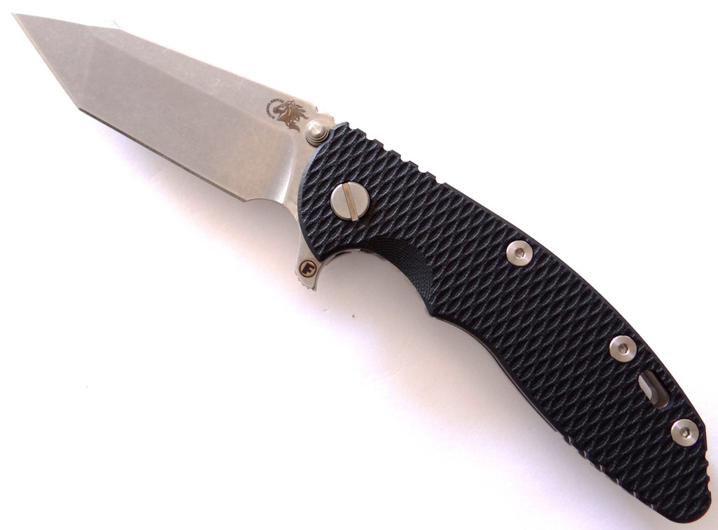 Rick Hinderer Knives Horse Head Logo Fatty XM-18 3.5" Harpoon Tanto folding knife with thumb stud and flipper tab - shown open presentation side.  Stonewash S35VN stainless steel plain edge blade.  Black G-10 handle with stonewash lock side.  Model K2506SGS00.
For reference only.