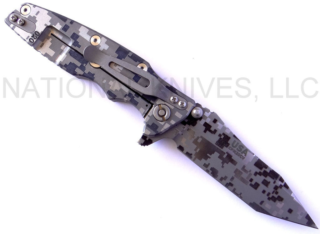 Rick Hinderer Knives Digi Camo Edition Eklipse Harpoon Tanto folding knife with thumb stud and flipper tab - shown open lock side.  Working Finish 20CV stainless steel plain edge blade.  OD green G-10 handle with Working Finish lock side.  Model K40042S000.
For reference only.
