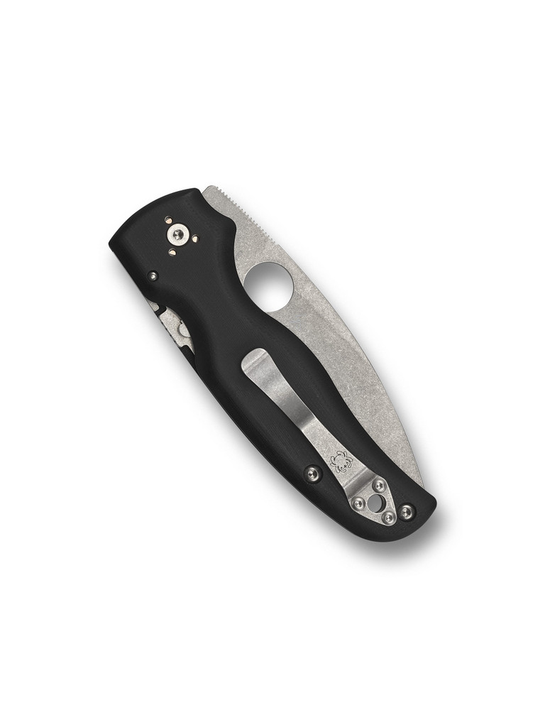 Spyderco Shaman folding knife with thumb hole - shown closed pocket clip side.  Stonewash S30V stainless steel plain edge blade.  Black G-10 handle.  Model C229GP.