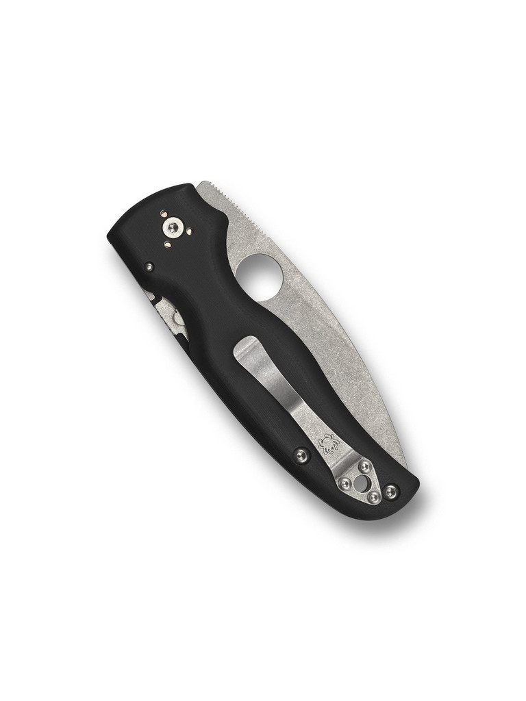 Spyderco Shaman folding knife with thumb hole - shown closed pocket clip side.  Stonewash S30V stainless steel serrated edge blade.  Black G-10 handle.  Model C229GS.
