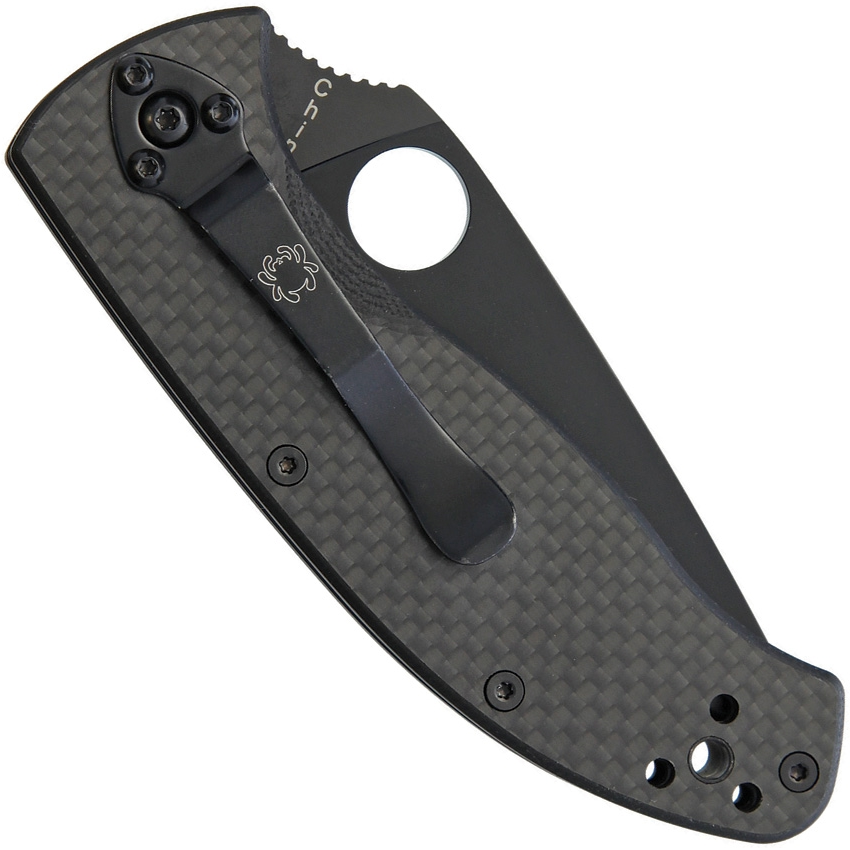 Spyderco Tenacious Blue Ridge Knives Exclusive folding knife with thumb hole - shown closed pocket clip side.  Black 8Cr13MoV stainless steel plain edge blade.  Black carbon fiber handle.  C122CFBBKP.
For reference only.