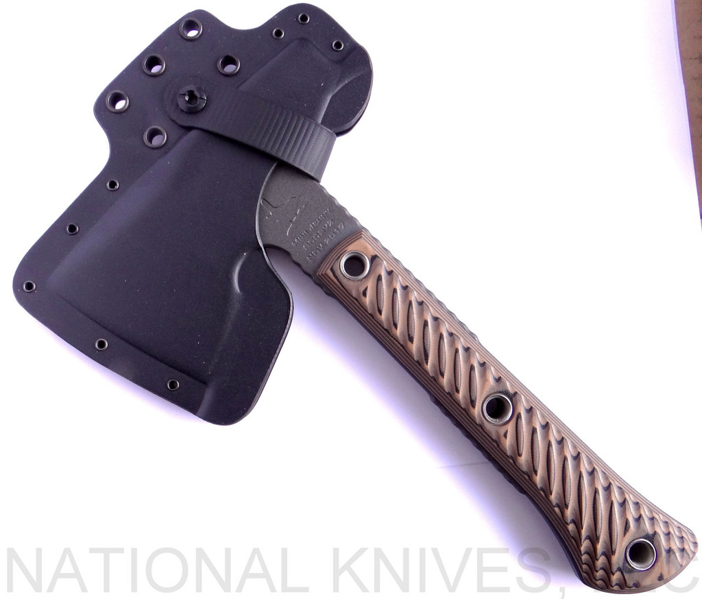RMJ Tactical Mini Jenny Hammer Pole tomahawk - shown in sheath reverse.  Tungsten Cerakote 80CRV2 steel plain edge head.  Hyena Brown G-10 handle.  
For reference only.