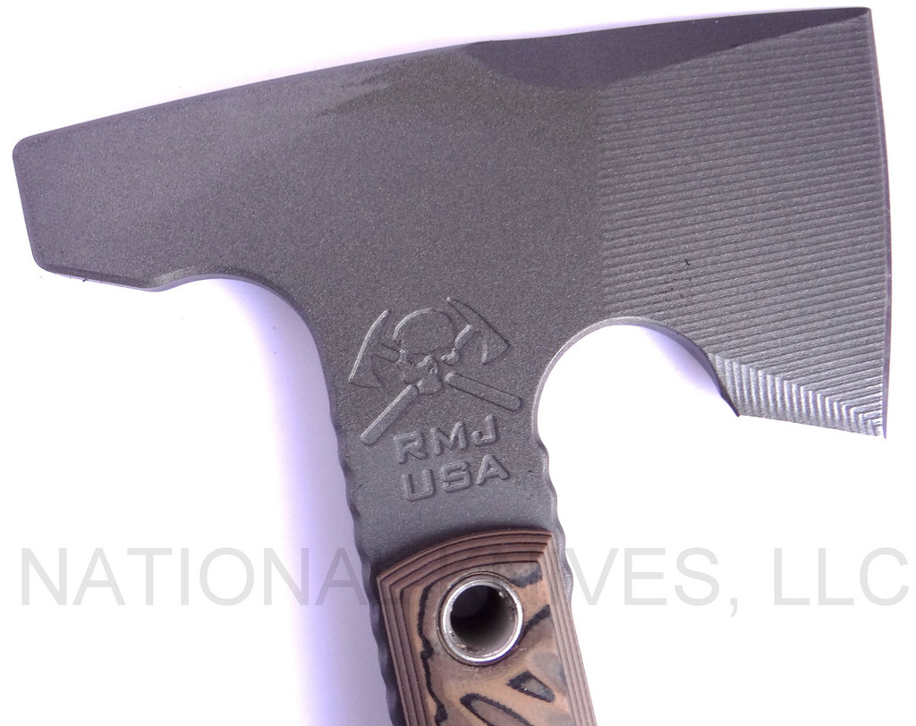 RMJ Tactical Mini Jenny Hammer Pole tomahawk - close up of head out of sheath obverse shown.  Tungsten Cerakote 80CRV2 steel plain edge head.  Hyena Brown G-10 handle.  
For reference only.