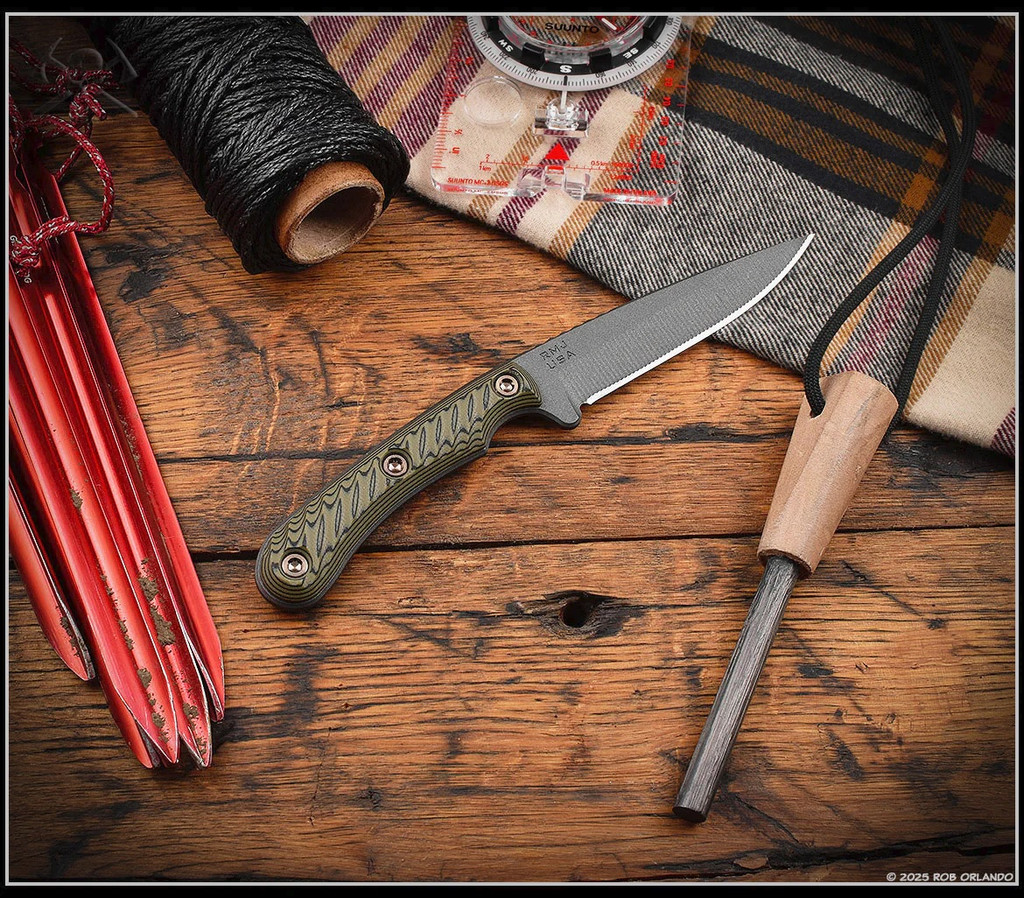RMJ Tactical Sparrow fixed blade knife - shown out of sheath reverse.  Tungsten Cerakote Nitro-V stainless steel plain edge blade.  Dirty Olive G-10 handle.  Model K-SP-TU-DO
