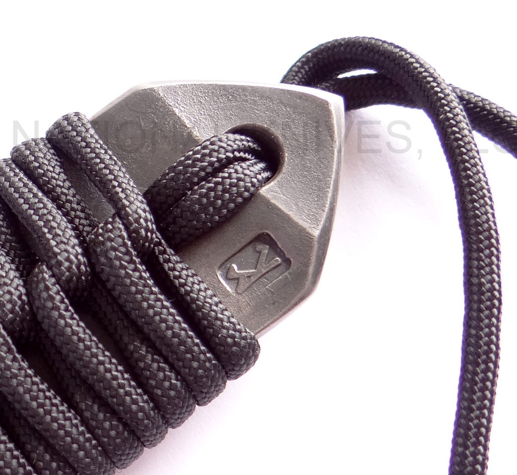 RMJ Tactical Custom Range 37 Kestrel tomahawk - shown close up of handle end reverse.  80CRV2 steel plain edge head.  Black cord-wrapped handle.
For reference only.