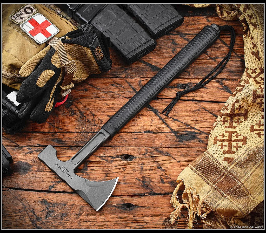 RMJ Tactical Loggerhead tomahawk - shown out of sheath reverse.  Tungsten Cerakote 80CRV2 plain edge head.  Black rubber handle.  Model T-L15-TU-BL.