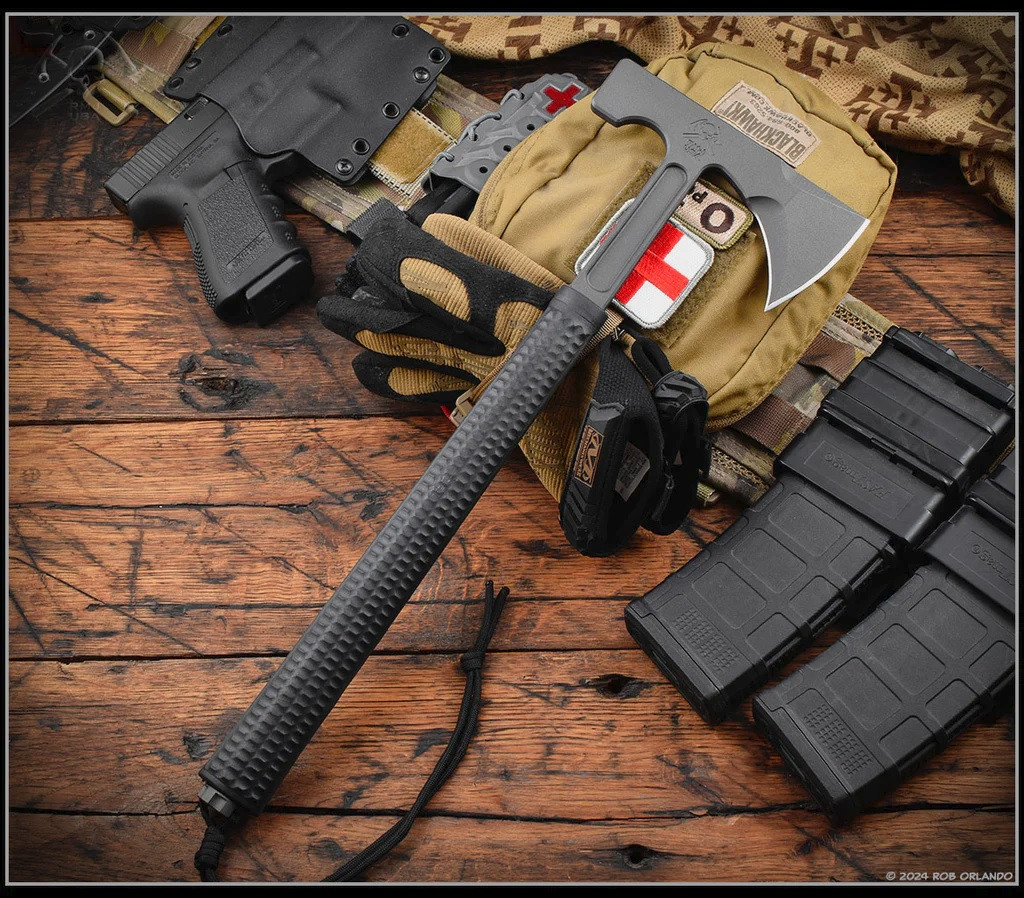 RMJ Tactical Loggerhead tomahawk - shown out of sheath obverse.  Tungsten Cerakote 80CRV2 plain edge head.  Black rubber handle.  Model T-L15-TU-BL.